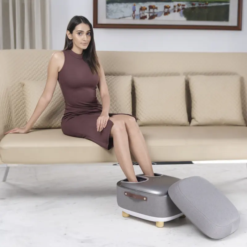 Woman taking massage on LI650 Foot Massager